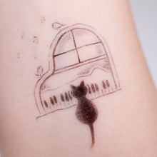 Load image into Gallery viewer, Black Cat Napping on A Piano Safe, waterproof, and fashionable. Cute Matching Tattoo ideas, Black Cat Lucky Cat Body Art, Blessing Tattoo Ideas, Fun Animal Fashion Accessories, Pet Toy, Doodle Cat Tattoos, Piano Tattoos, Fairy Tale Accessories.
