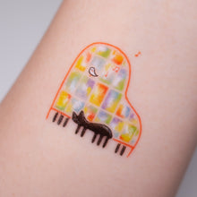 Load image into Gallery viewer, Black Cat Napping on A Piano Safe, waterproof, and fashionable. Cute Matching Tattoo ideas, Black Cat Lucky Cat Body Art, Blessing Tattoo Ideas, Fun Animal Fashion Accessories, Pet Toy, Doodle Cat Tattoos, Piano Tattoos, Fairy Tale Accessories.