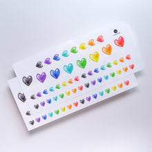 Load image into Gallery viewer,  7 Colors Rainbow Heart is a symbol of love, hope, and following what the heart wants. 紋身貼紙  7 Rainbow Hearts Tattoos (Color)LAZY DUO Temporary Tattoo Sticker since 2015. Original Illustrative designs created by tattoo artists! Safe, waterproof, and fashionable. Cute Matching Tattoo ideas, Black Cat Lucky Cat Body Art, Blessing Tattoo Ideas, Fun Animal Fashion Accessories, Pet Toy, Doodle Cat Tattoos, Piano Tattoos, Fairy Tale Accessories.
