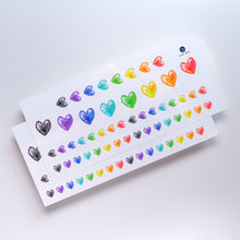 Load image into Gallery viewer, 7 Colors Rainbow Heart is a symbol of love, hope, and following what the heart wants. 紋身貼紙 7 Rainbow Hearts Tattoos (Color)LAZY DUO Temporary Tattoo Sticker since 2015. Original Illustrative designs created by tattoo artists! Safe, waterproof, and fashionable. Cute Matching Tattoo ideas, Black Cat Lucky Cat Body Art, Blessing Tattoo Ideas, Fun Animal Fashion Accessories, Pet Toy, Doodle Cat Tattoos, Piano Tattoos, Fairy Tale Accessories.