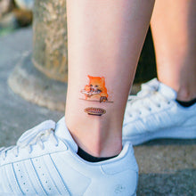 Load image into Gallery viewer, Cat Loves Fish Tattoo - LAZY DUO TATTOO Life of Cat Feeding Tattoo Ideas Golden Kitten Tattoo Meow Naughty Cat Neko Tattoos HK Temporary Tattoo Sticker Water Color Tattoo LAZY DUO Tattoo Shop Hong Kong HK 愛玩百厭貓紋身黃貓浪浪喵寵物刺青 浪浪香港紋身貼紙刺青紋身師設計印刷訂做客製 Custom Temporary Tattoo Event Printing Tattooist artist HK tattoo shop MANE INK Tattooer Tattoo Artist Taiwan fine line ornament tattoo 台灣製 刺青師紋身師