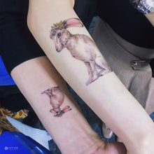 Load image into Gallery viewer, Watercolor Bunny with Flower Band Tattoos - LAZY DUO TATTOO