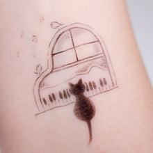 Load image into Gallery viewer, Black Cat Napping on A Piano Safe, waterproof, and fashionable. Cute Matching Tattoo ideas, Black Cat Lucky Cat Body Art, Blessing Tattoo Ideas, Fun Animal Fashion Accessories, Pet Toy, Doodle Cat Tattoos, Piano Tattoos, Fairy Tale Accessories.
