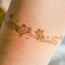 Load image into Gallery viewer, Japanese Pond Turtle Tattoo Band - LAZY DUO TATTOO Japanese Tattoo design by Mane ink Tattooist 池龜香港刺青 紋身貼紙 tattoo hong kong minimal color tattoo 動物刺青 彩色刺青 女刺青師 認領圖日系小清新 韓國刺青 hongkongtattoo 香港女紋身師 Japanesetattoo TattooShopHK hktattooshop tattooartist hongkongtattoo tattoohongkong 香港紋身 香港刺青 tattooist 紋身貼紙 鯉 oceantattoo colortattoo 彩色刺青 海浪刺青 動物刺青 浪浪香港紋身貼紙刺青紋身師設計印刷訂做客製 Custom Temporary Tattoo Event Printing Tattooist artist HK tattoo shop MANE
