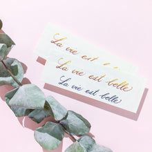 Load image into Gallery viewer, Watercolor Lettering Tattoo・La Vie est Belle - LAZY DUO TATTOO
