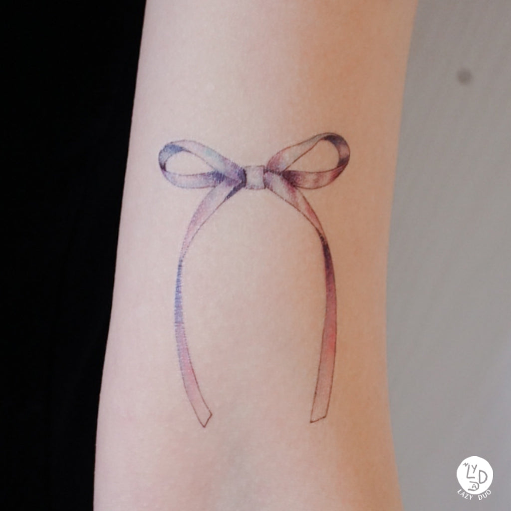 A cute little bow 🎀 #tattoo #microrealism #blackandgreytattoo #bow #bows # ribbon #cheerleading | Instagram