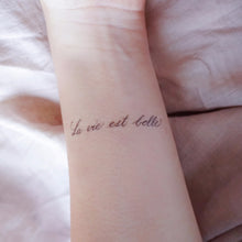 Load image into Gallery viewer, Watercolor Lettering Tattoo・La Vie est Belle - LAZY DUO TATTOO
