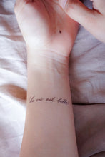 Load image into Gallery viewer, Watercolor Lettering Tattoo・La Vie est Belle - LAZY DUO TATTOO
